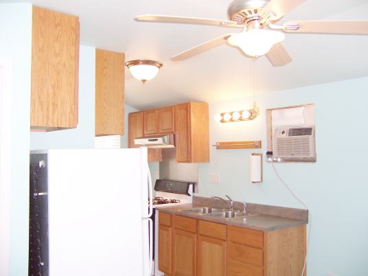 Kitchen has full stainless double sink with garbage disposal and sprayer.