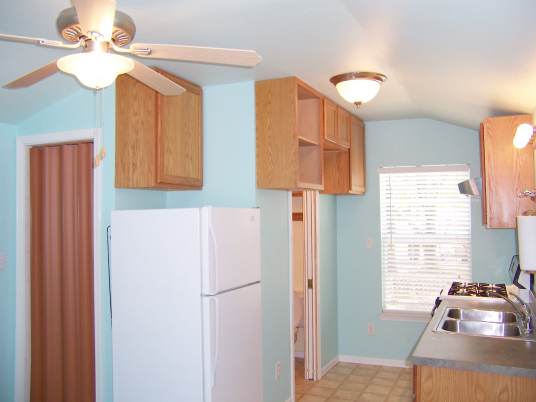 Entrance to bathroom with pocket door open.