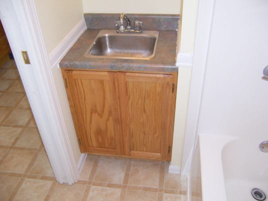 Oak Vanity Matches Kitchen Cabinets